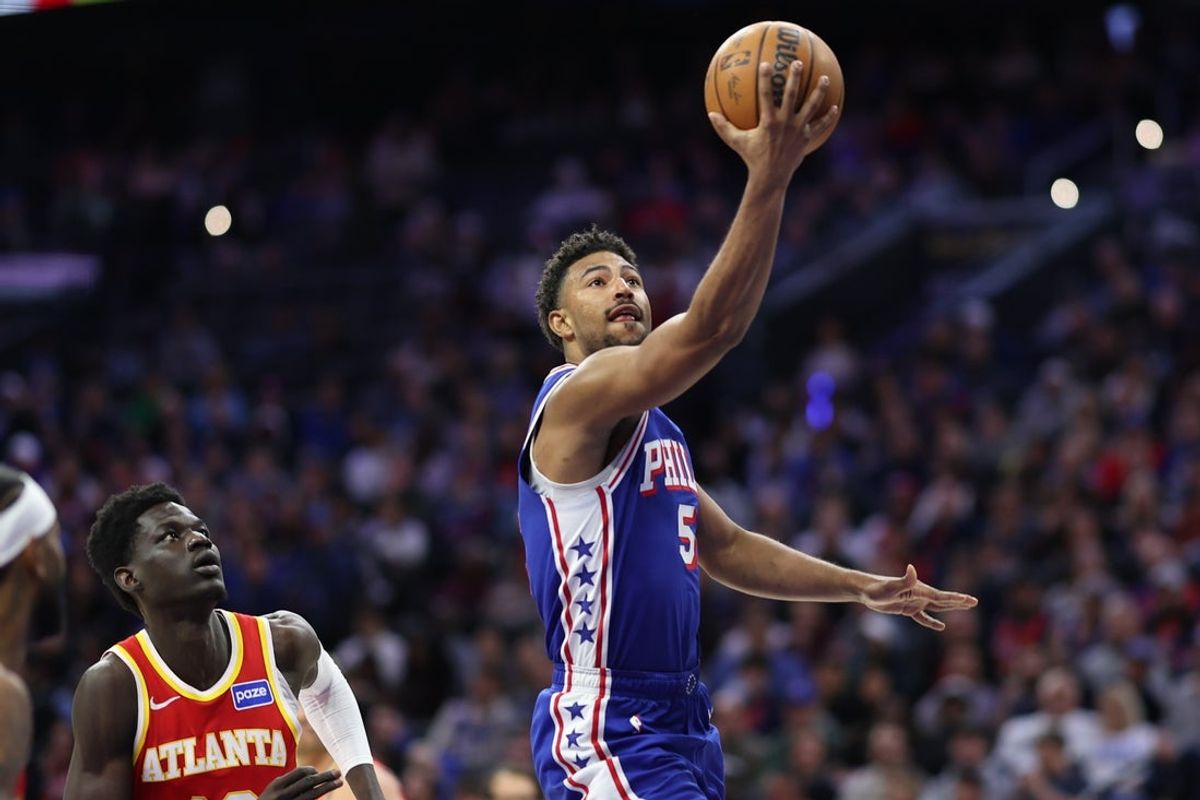 Feb 19, 2026; Philadelphia, Pennsylvania, USA; Philadelphia 76ers guard Quentin Grimes (5) drives for a score against the Atlanta Hawks during the third quarter at Xfinity Mobile Arena. Mandatory Credit: Bill Streicher-Imagn Images