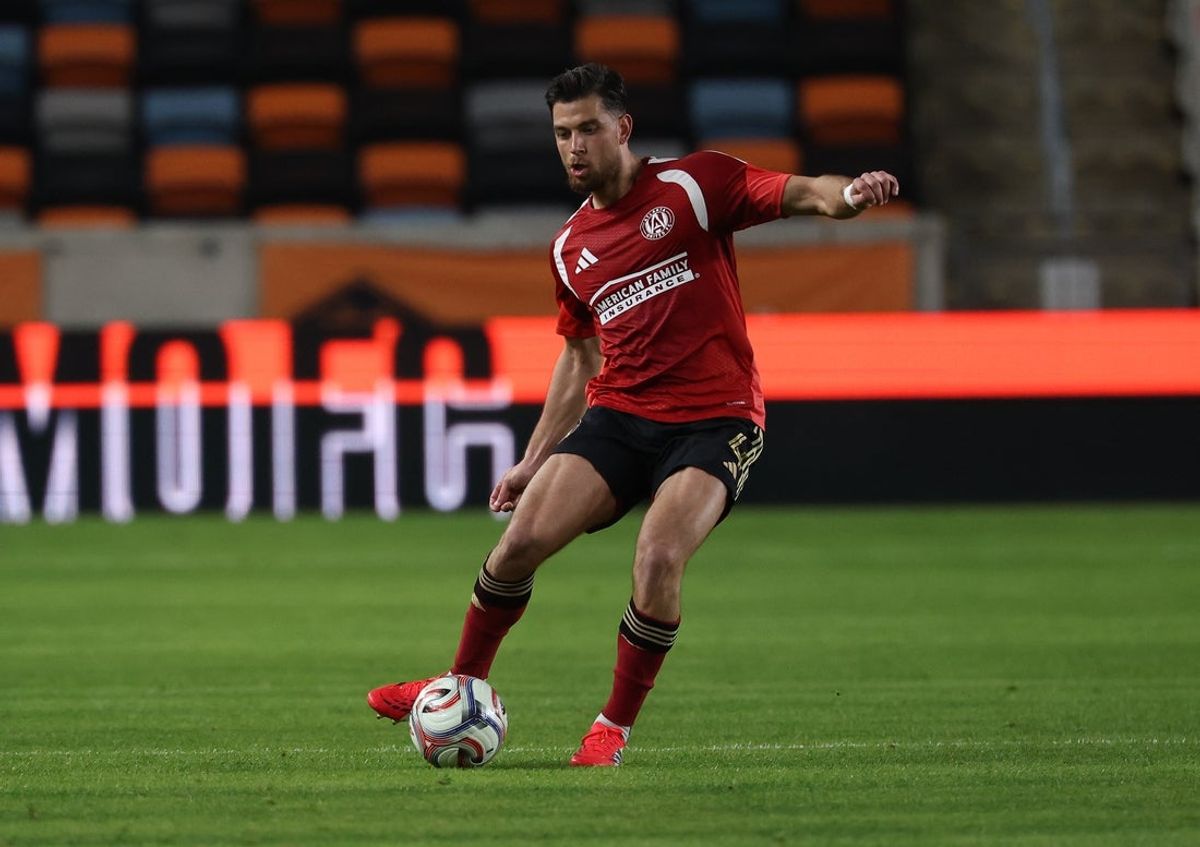 Feb 7, 2026; Houston, Texas, USA;  Atlanta United FC defender Enea Mihaj (4) dribbles against the Houston Dynamo FC in a preseason game at Shell Energy Stadium in Houston, TX.  Mandatory Credit: Thomas Shea-Imagn Images