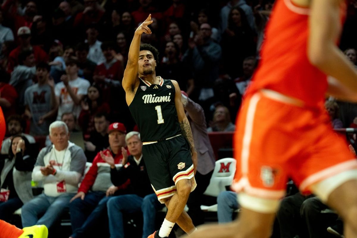 Miami RedHawks guard Trey Perry (1) gestures after hitting a 3-point basket in the second half of the NCAA game on Feb. 20, 2026 at Millett Hall in Oxford, Ohio.