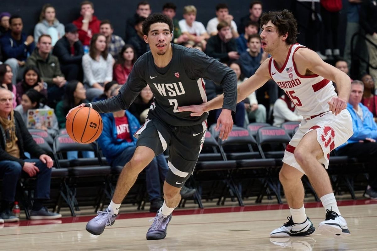 Jan 18, 2024; Stanford, California, USA; Washington State Cougars guard Myles Rice (2) dribbles the ball against Stanford Cardinal guard Benny Gealer (15) during the first half at Maples Pavilion.