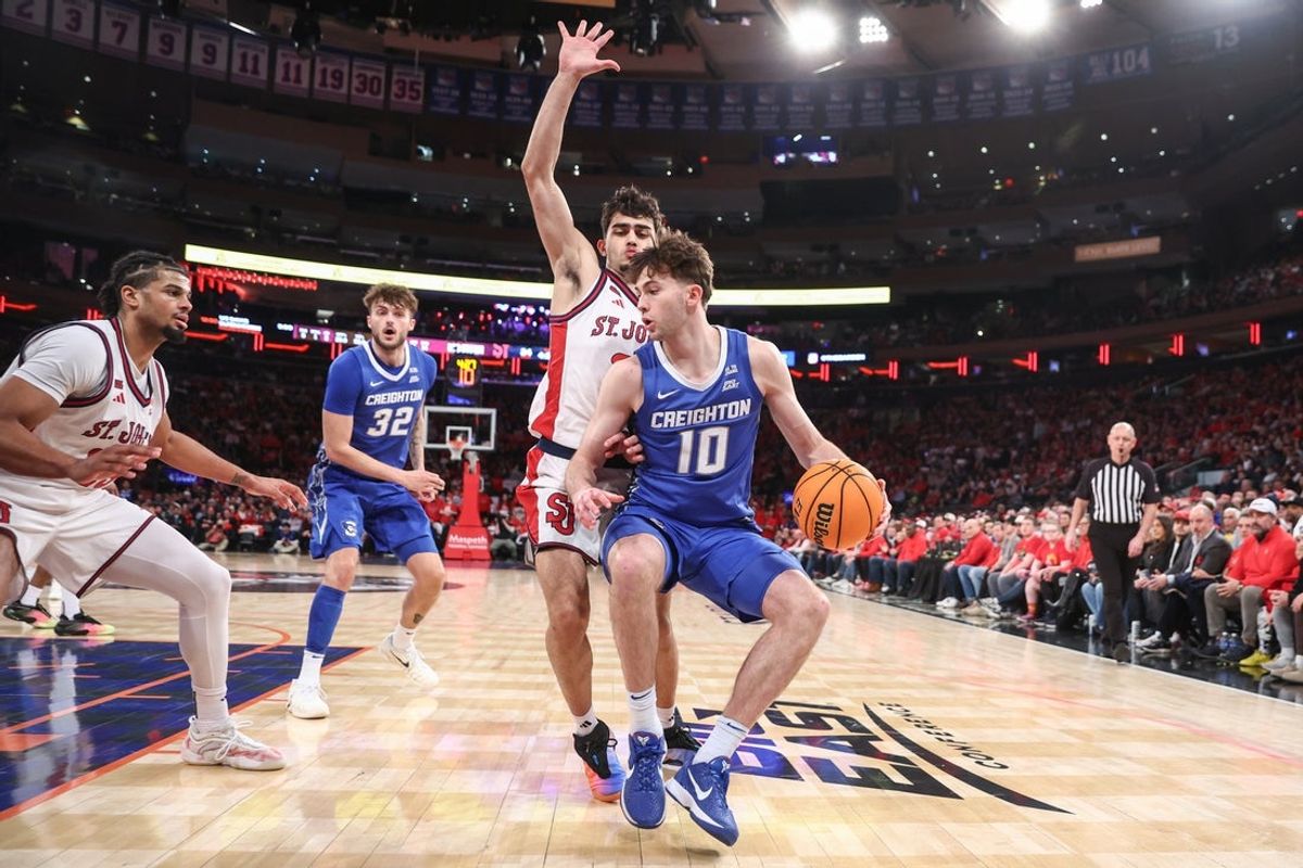 Feb 21, 2026; New York, New York, USA;  Creighton Bluejays guard Hudson Greer (10) looks to drive past St. John's Red Storm guard Lefteris Liotopoulos (31) in the first half at Madison Square Garden. Mandatory Credit: Wendell Cruz-Imagn Images