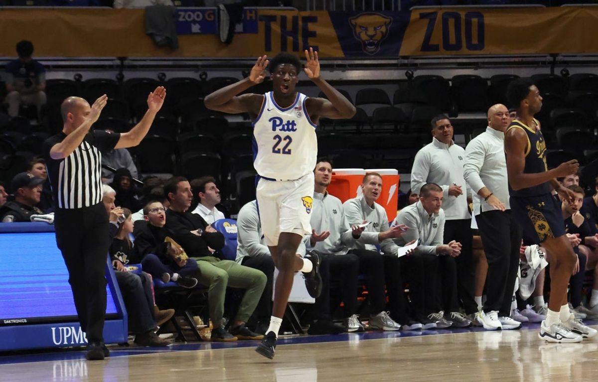 Feb 21, 2026; Pittsburgh, Pennsylvania, USA;  Pittsburgh Panthers guard Barry Dunning Jr. (22) reacts after making a three point basket against the Notre Dame Fighting Irish during the first half at the Petersen Events Center. Mandatory Credit: Charles LeClaire-Imagn Images