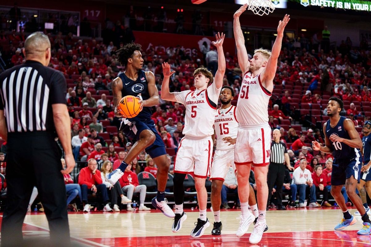 Feb 21, 2026; Lincoln, Nebraska, USA; Penn State Nittany Lions forward Mason Blackwood (1) looks to pass against Nebraska Cornhuskers forward Braden Frager (5), forward Rienk Mast (51) and forward Jared Garcia (15) during the second half at Pinnacle Bank Arena. Mandatory Credit: Dylan Widger-Imagn Images