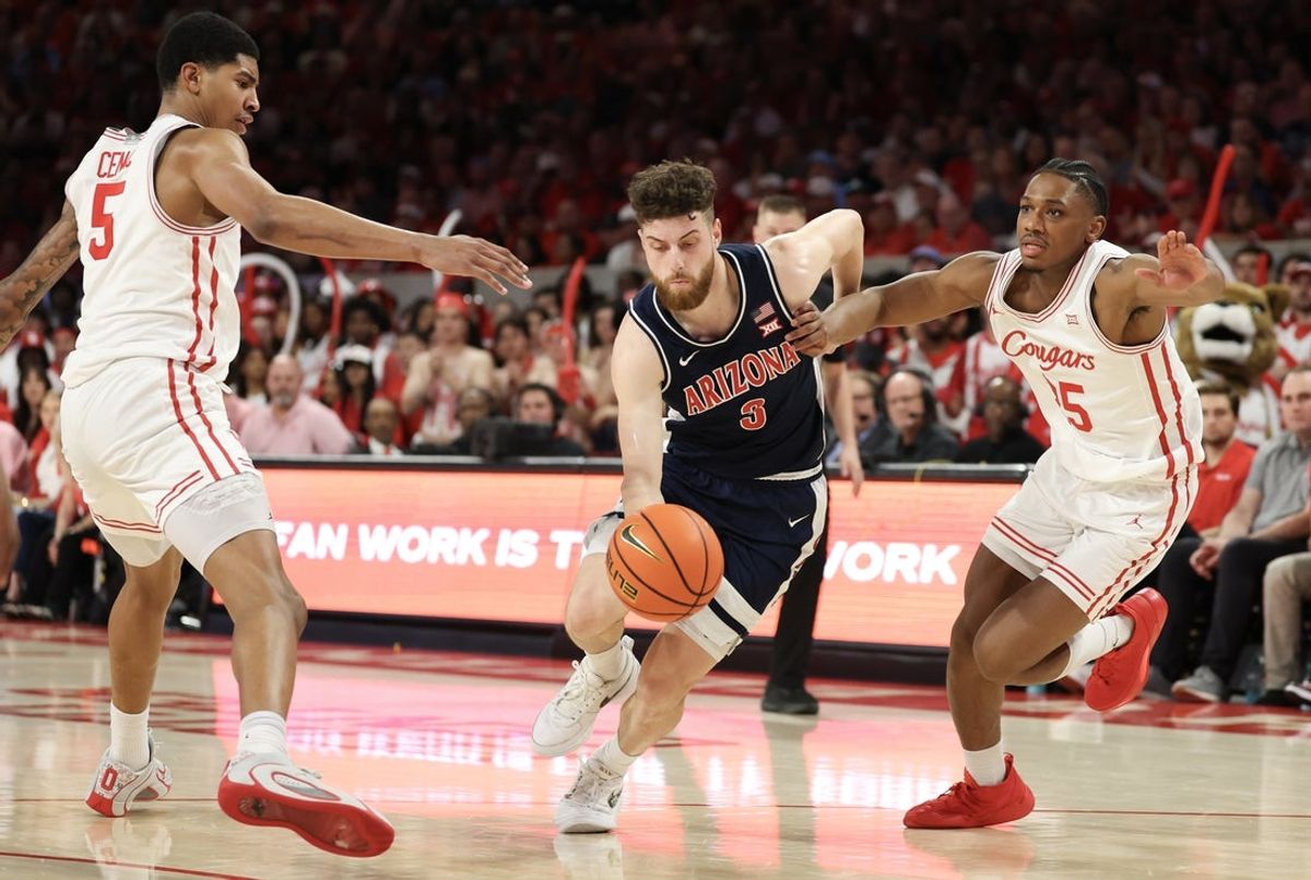 Feb 21, 2026; Houston, Texas, USA;  Arizona Wildcats guard Anthony Dell'orso (3) splits the defense of Houston Cougars center Chris Cenac Jr. (5) and guard Mercy Miller (25) in the first half at Fertitta Center. Mandatory Credit: Thomas Shea-Imagn Images