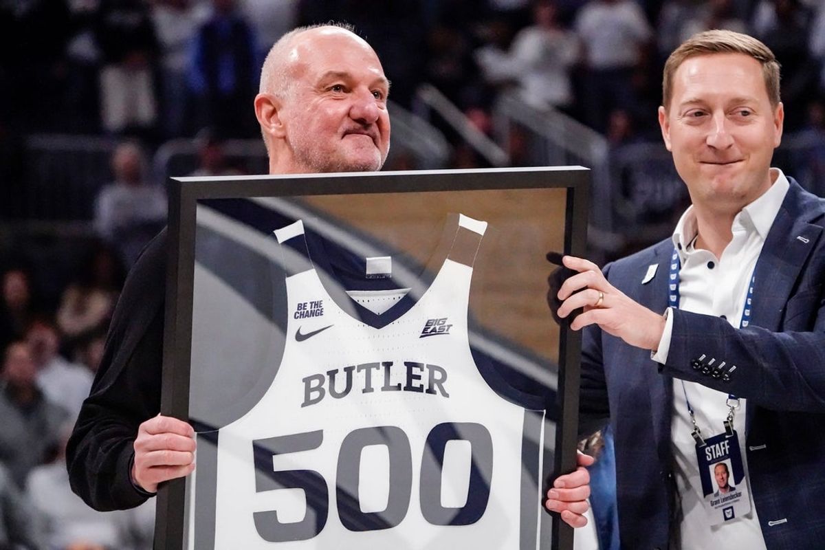 (From left) Butler Basketball Coach, Thad Matta and Butler AD Grant Leiendecker celebrate Matta’s 500th game win before a game between the Xavier Musketeers and Butler Bulldogs on Saturday, Feb. 21, 2026, at Hinkle Fieldhouse in Indianapolis.