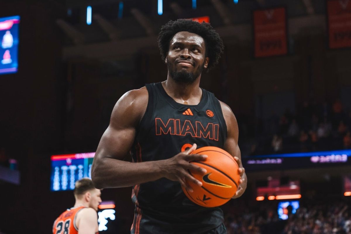 Feb 21, 2026; Charlottesville, Virginia, USA; Miami (FL) Hurricanes center Ernest Udeh Jr. (8) reacts after a play in the second half against the Virginia Cavaliers at John Paul Jones Arena. Mandatory Credit: Emily Faith Morgan-Imagn Images