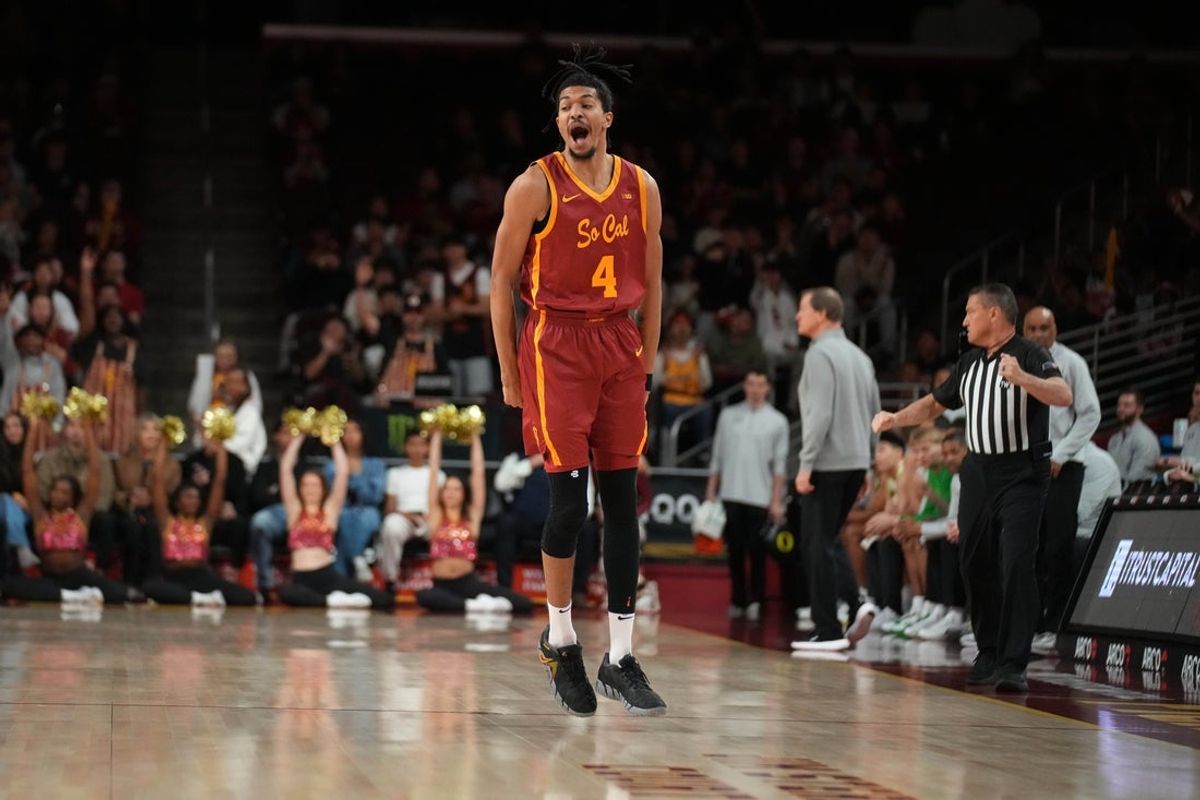 Feb 21, 2026; Los Angeles, California, USA; Southern California Trojans forward Chad Baker-Mazara (4) reacts after a three-point basket against the Oregon Ducks in the first half at Galen Center. Mandatory Credit: Kirby Lee-Imagn Images