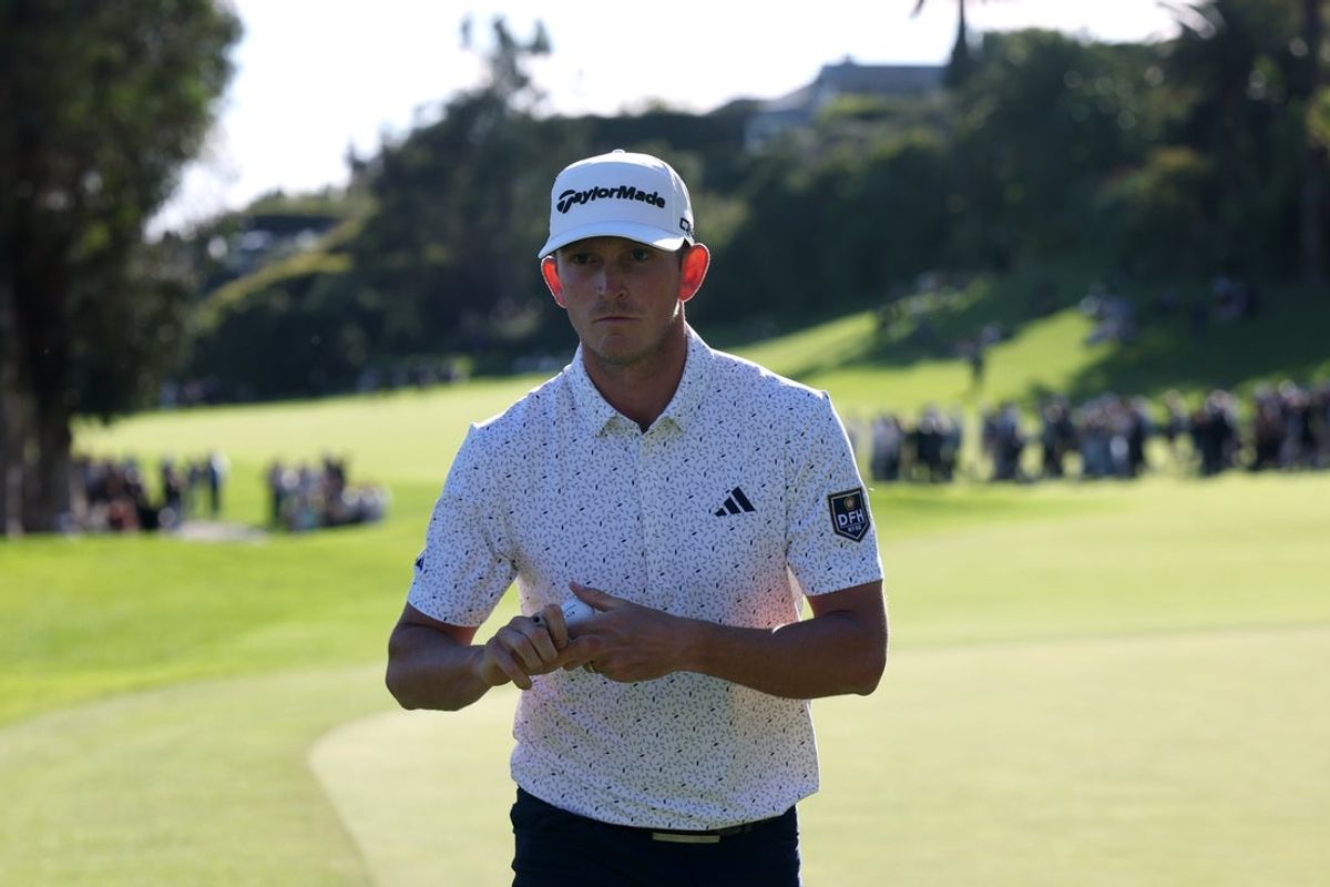 Feb 21, 2026; Pacific Palisades, California, USA;  Jacob Bridgeman looks on after completing the 18th hole during the third round of the The Genesis Invitational golf tournament at Riviera Country Club. Mandatory Credit: Kiyoshi Mio-Imagn Images