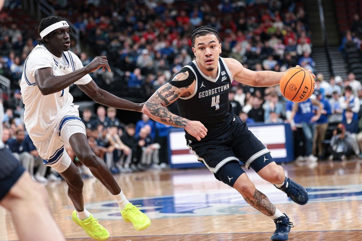 Feb 21, 2026; Newark, New Jersey, USA; Georgetown Hoyas forward Caleb Williams (4) drives to the basket against Seton Hall Pirates forward Jacob Dar (1) during the first half at Prudential Center. Mandatory Credit: Vincent Carchietta-Imagn Images