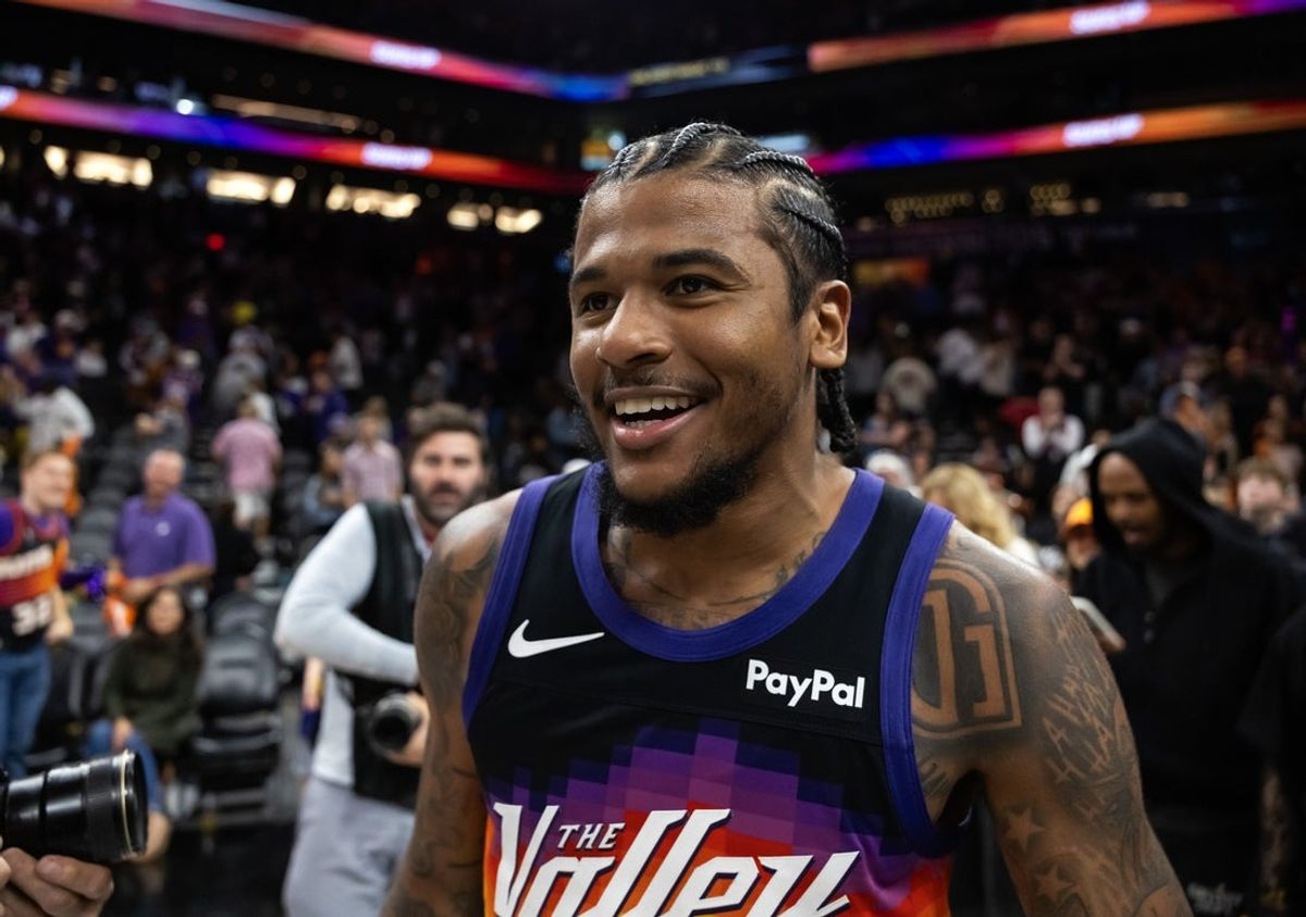 Feb 21, 2026; Phoenix, Arizona, USA; Phoenix Suns guard Jalen Green (4) celebrates after defeating the Orlando Magic in double overtime at Mortgage Matchup Center. Mandatory Credit: Mark J. Rebilas-Imagn Images