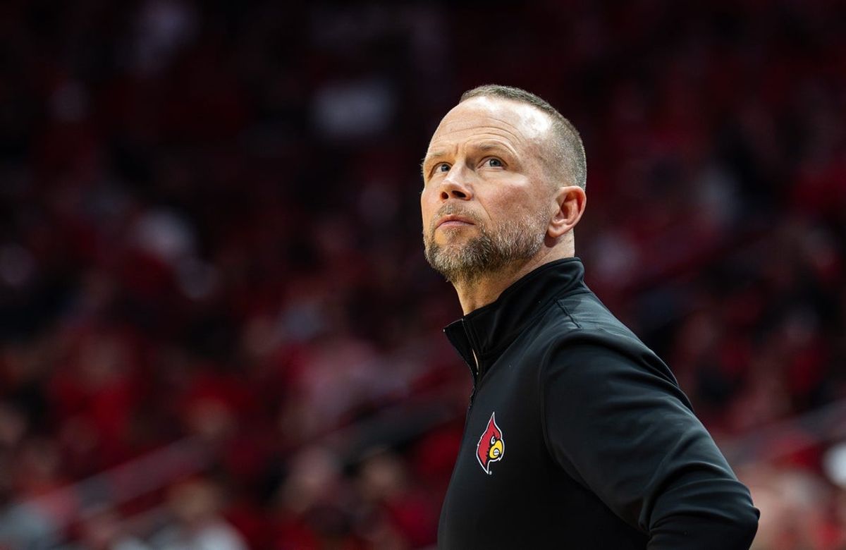 Louisville Cardinals head coach Pat Kelsey looks up at the scoreboard as the Louisville Cardinals host the Georgia Tech Yellow Jackets in an NCAA basketball game at the KFC Yum! Center, Saturday, Feb. 21, 2026, in Louisville.