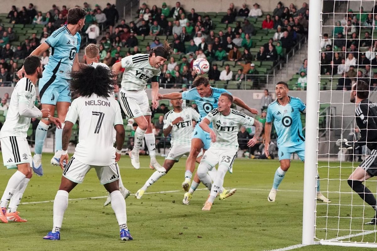 Feb 21, 2026; Austin, Texas, USA; Minnesota United defender Morris Duggan (23) headers the ball into the goal during the first half against Austin FC at Q2 Stadium. Mandatory Credit: Dustin Safranek-Imagn Images