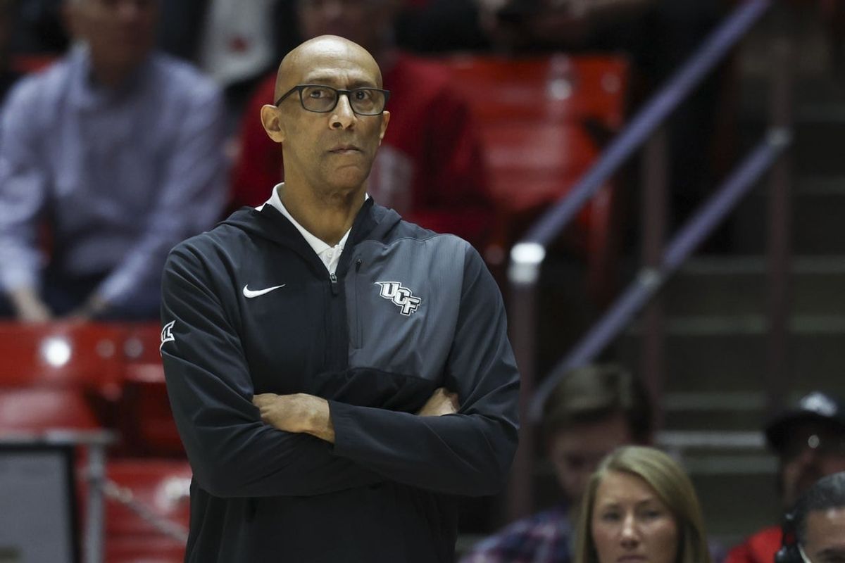 Feb 21, 2026; Salt Lake City, Utah, USA; UCF Knights head coach Johnny Dawkins looks on during the first half of a game against the Utah Utes at Jon M. Huntsman Center. Mandatory Credit: Rob Gray-Imagn Images
