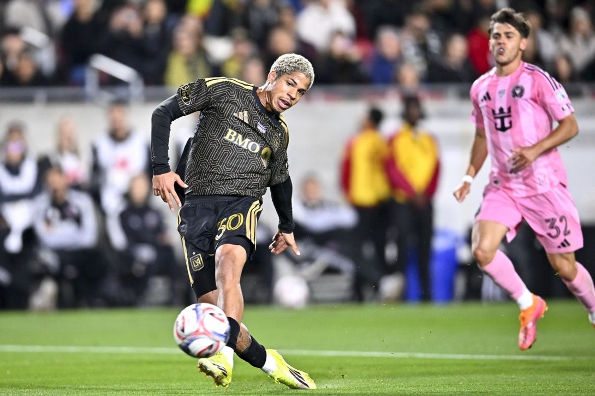 Feb 21, 2026; Los Angeles, California, USA; Los Angeles FC forward David Martínez (30) scores a goal against Inter Miami CF goalkeeper Dayne St. Clair (97) during the first half at Los Angeles Memorial Coliseum. Mandatory Credit: Kelvin Kuo-Imagn Images