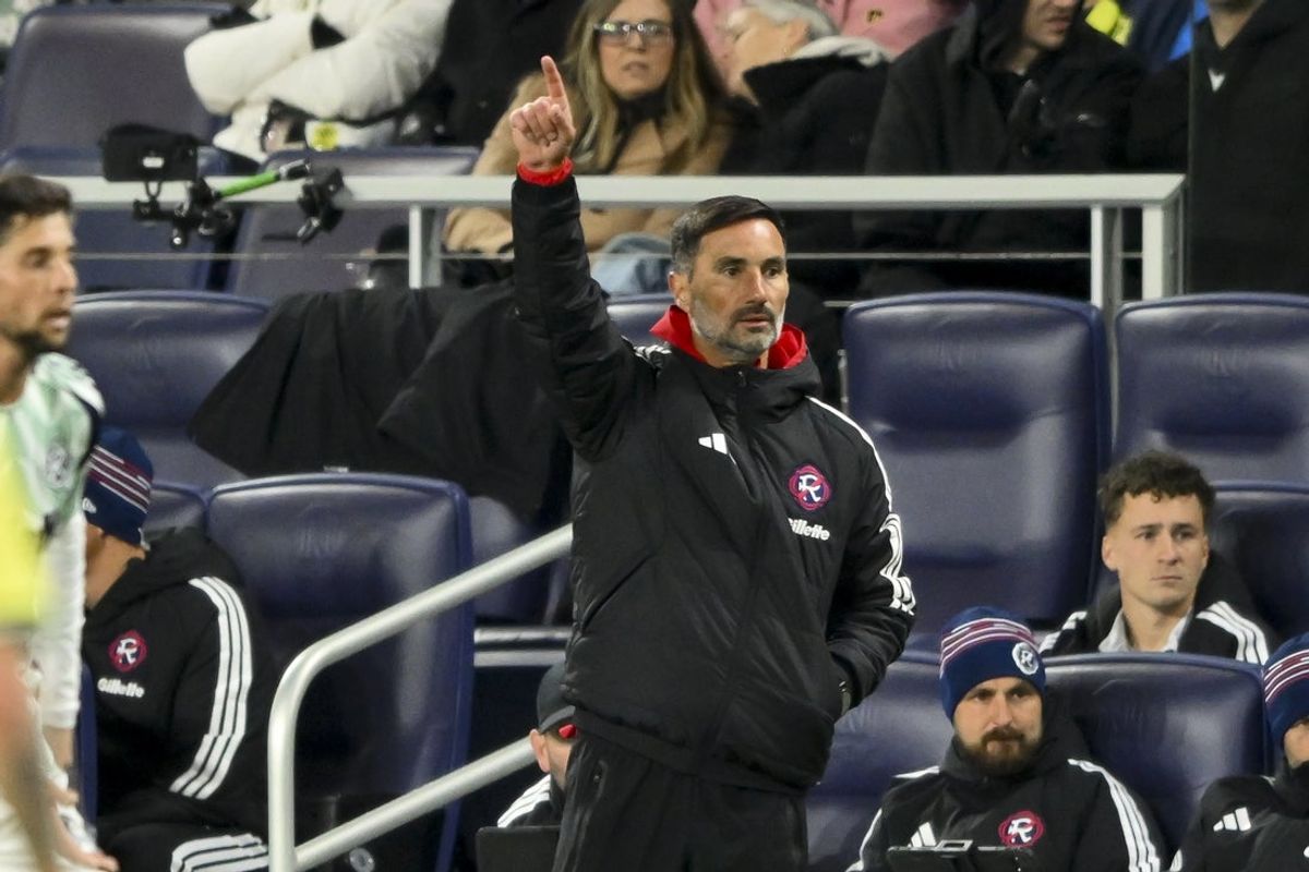 Feb 21, 2026; Nashville, Tennessee, USA;  New England Revolution head coach Marko Mitrovic yells a play to his team against Nashville SC during second half at Geodis Park. Mandatory Credit: Steve Roberts-Imagn Images