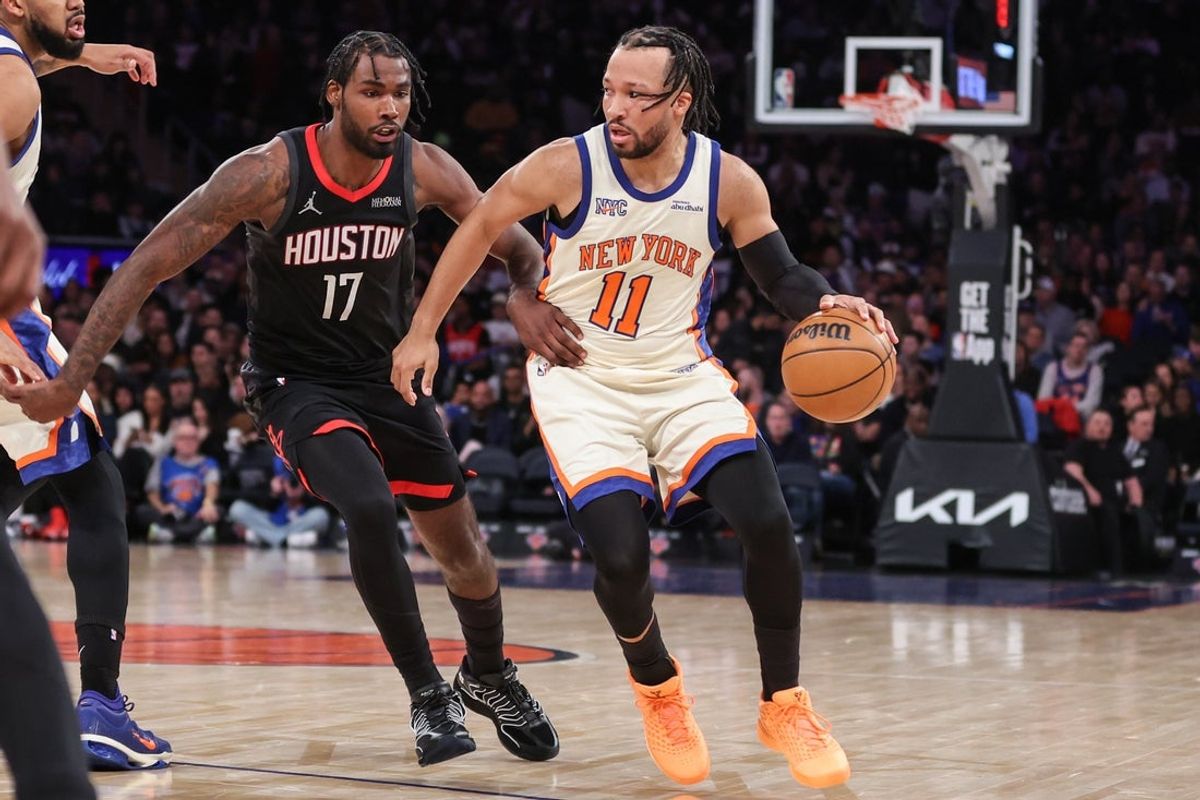 Feb 21, 2026; New York, New York, USA;  New York Knicks guard Jalen Brunson (11) looks to drive past Houston Rockets forward Tari Eason (17) in the third quarter at Madison Square Garden. Mandatory Credit: Wendell Cruz-Imagn Images