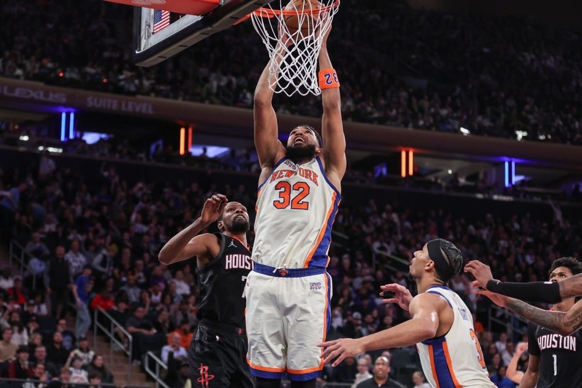 Feb 21, 2026; New York, New York, USA;  New York Knicks center Karl-Anthony Towns (32) goes up for a dunk in the third quarter against the Houston Rockets at Madison Square Garden. Mandatory Credit: Wendell Cruz-Imagn Images