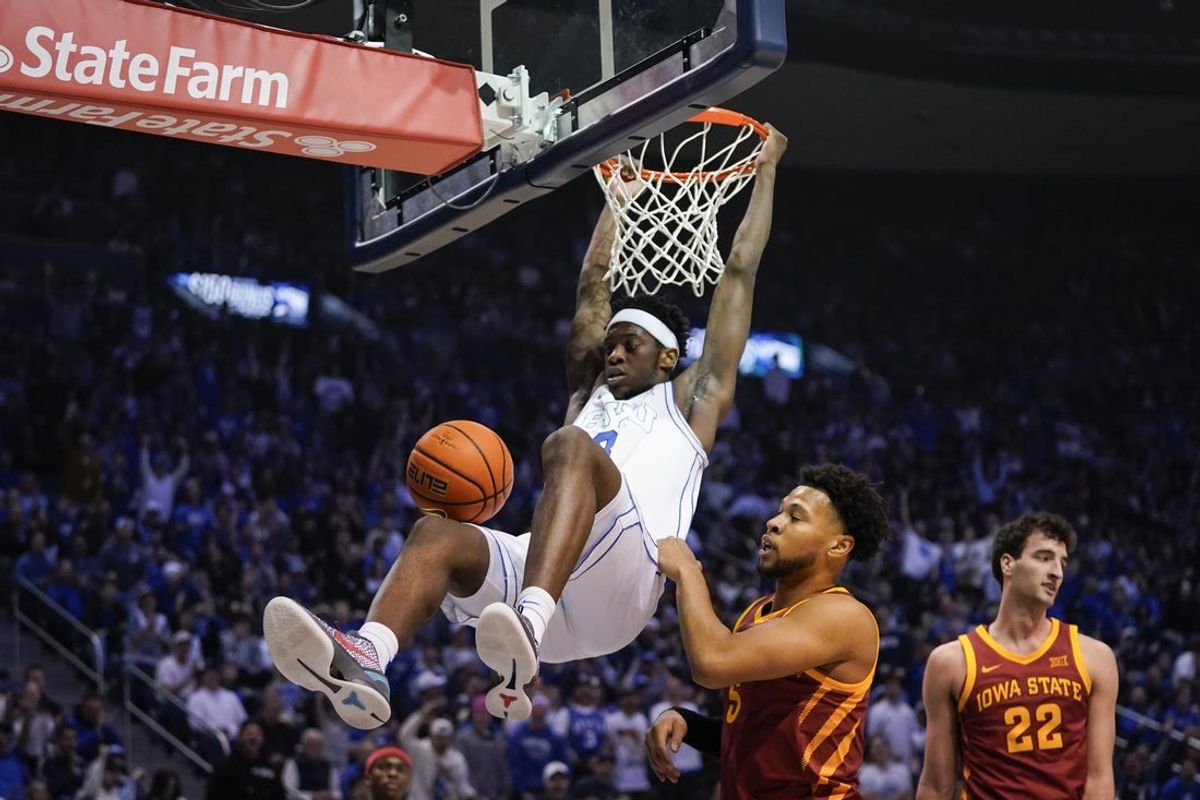 Feb 21, 2026; Provo, Utah, USA; BYU Cougars forward AJ Dybantsa (3) dunks during the first half against the Iowa State Cyclones at Marriott Center. Mandatory Credit: Aaron Baker-Imagn Images