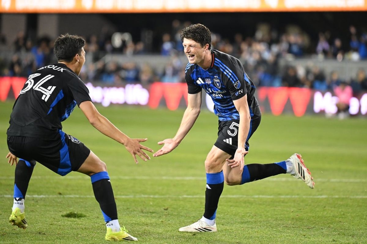Feb 21, 2026; San Jose, California, USA; San Jose Earthquakes defender Daniel Munie (5) celebrates with midfielder Beau Leroux (34) after scoring his second goal of the match against Sporting Kansas City in the second half at PayPal Park. Mandatory Credit: Robert Edwards-Imagn Images