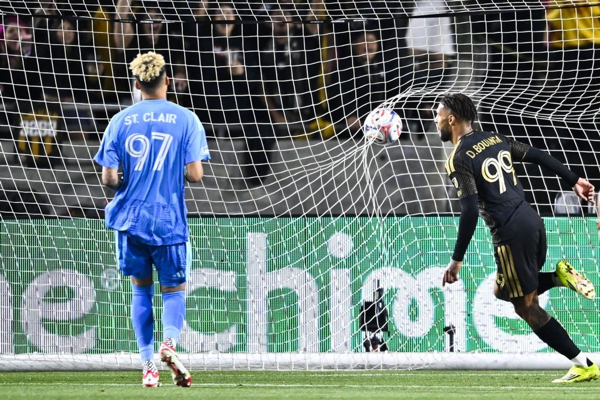 Feb 21, 2026; Los Angeles, California, USA; Los Angeles FC forward Denis Bouanga (99) celebrates his goal past Inter Miami CF goalkeeper Dayne St. Clair (97) during the second half at Los Angeles Memorial Coliseum. Mandatory Credit: Kelvin Kuo-Imagn Images