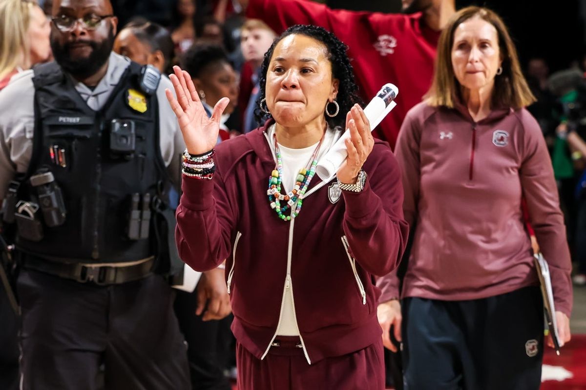 Feb 22, 2026; Columbia, South Carolina, USA; South Carolina Gamecocks head coach Dawn Staley claps following their defeat of the Mississippi Rebels at Colonial Life Arena. Mandatory Credit: Jeff Blake-Imagn Images