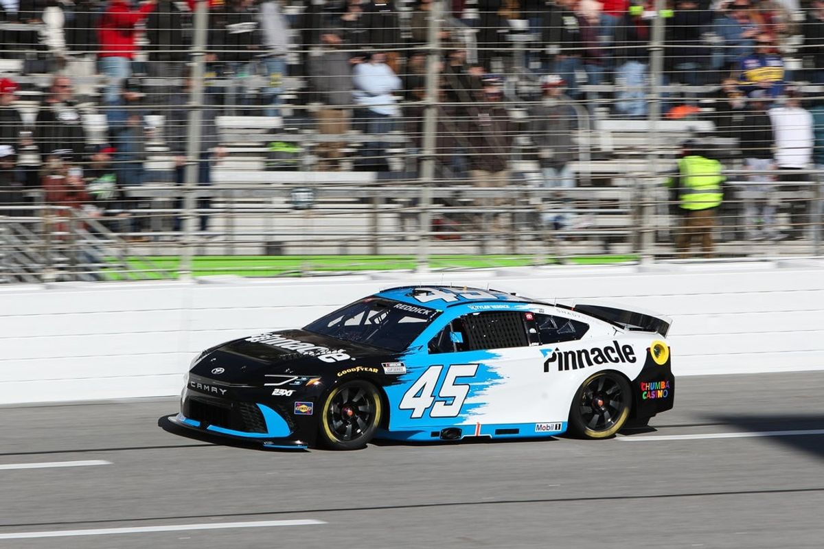 Feb 22, 2026; Hampton, Georgia, USA; NASCAR Cup Series driver Tyler Reddick rounds the track at EchoPark Speedway. Mandatory Credit: Mady Mertens-Imagn Images