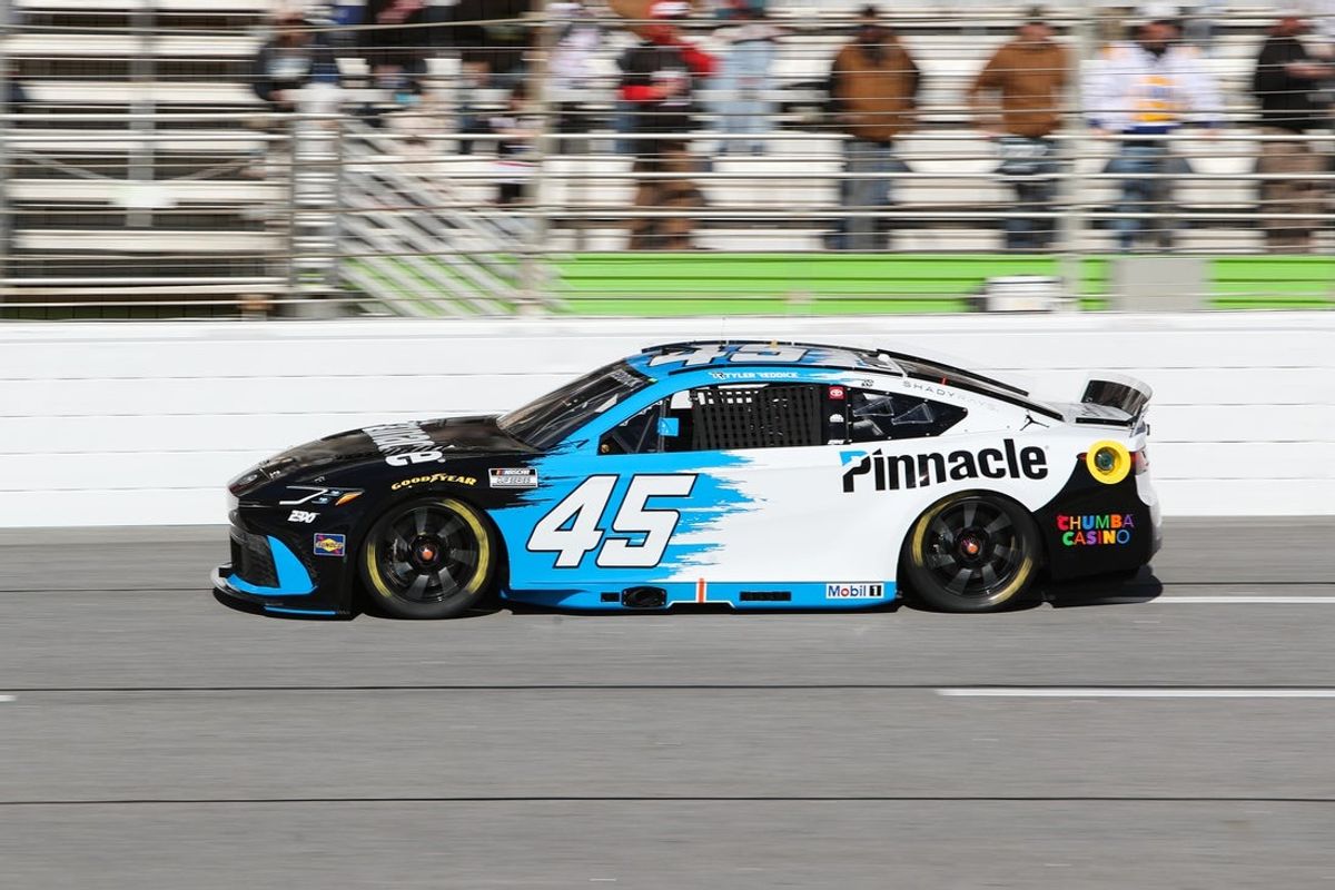 Feb 22, 2026; Hampton, Georgia, USA; NASCAR Cup Series driver Tyler Reddick rounds the track at EchoPark Speedway. Mandatory Credit: Mady Mertens-Imagn Images