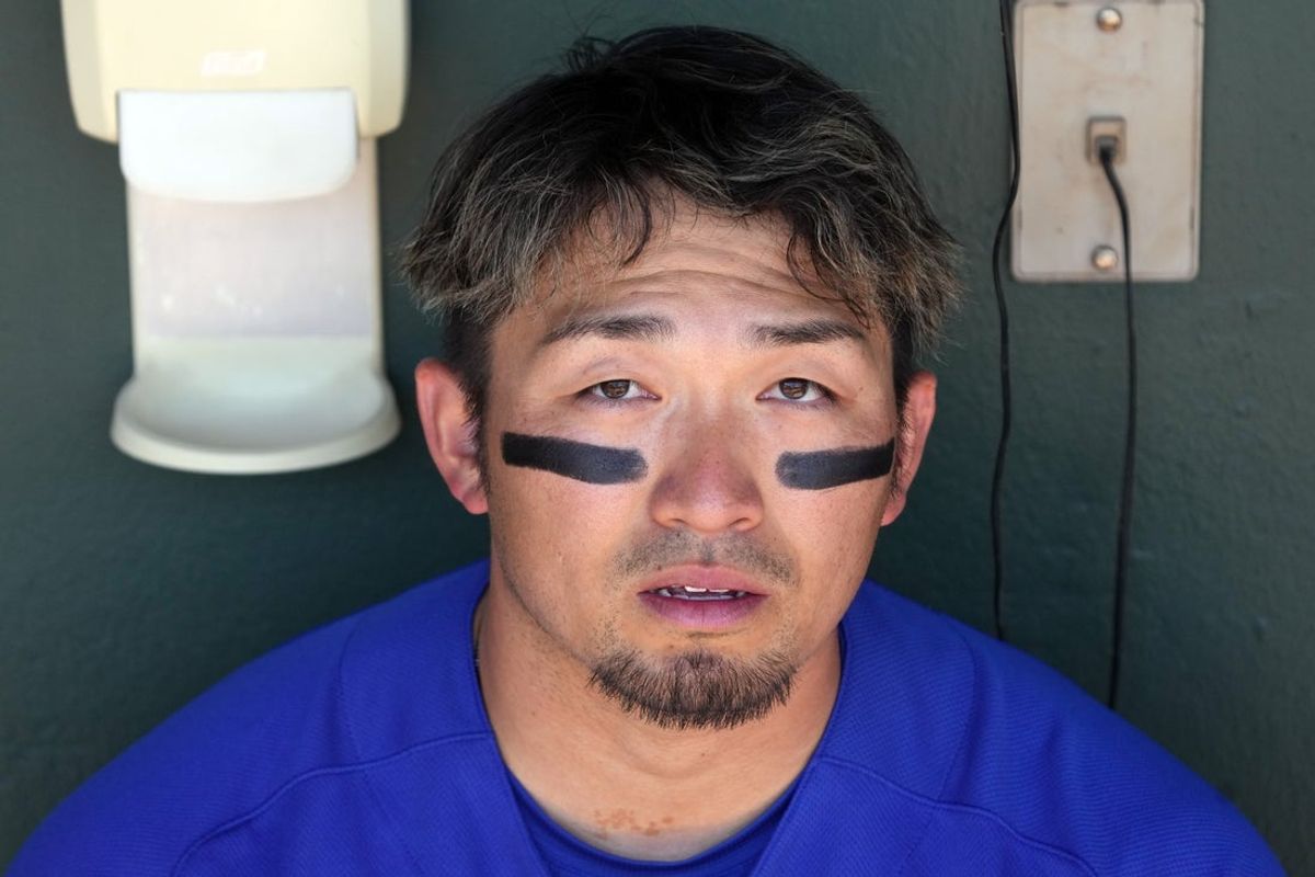Feb 22, 2026; Scottsdale, Arizona, USA; Chicago Cubs right fielder Seiya Suzuki (27) gets ready to hit against the San Francisco Giants in the first inning at Scottsdale Stadium. Mandatory Credit: Rick Scuteri-Imagn Images