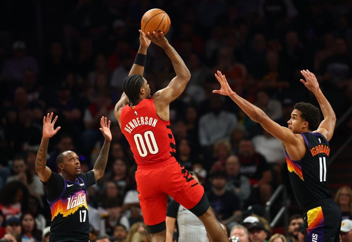 Feb 22, 2026; Phoenix, Arizona, USA; Portland Trail Blazers guard Scoot Henderson (00) shoots the ball against the Phoenix Suns in the first half at Mortgage Matchup Center. Mandatory Credit: Mark J. Rebilas-Imagn Images