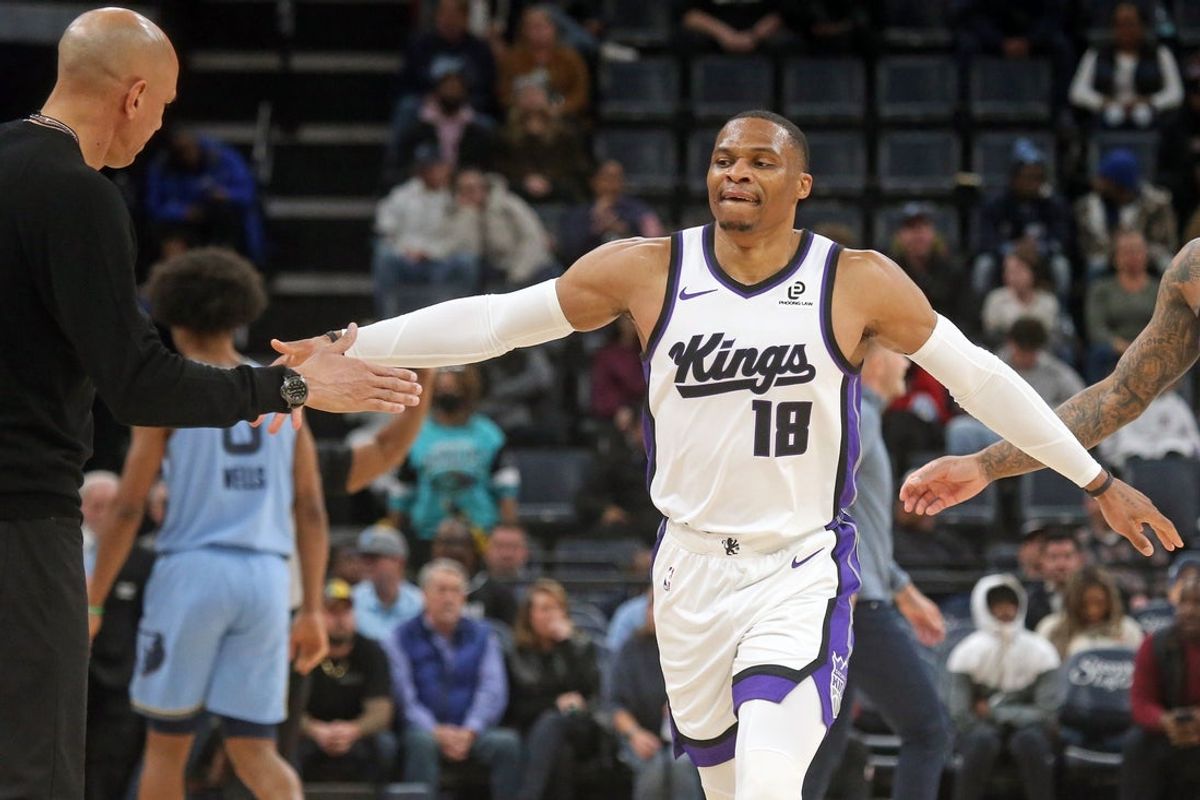 Feb 23, 2026; Memphis, Tennessee, USA; Sacramento Kings guard Russell Westbrook (18) reacts with head coach Doug Christie during a timeout during the fourth quarter against the Memphis Grizzlies at FedExForum. Mandatory Credit: Petre Thomas-Imagn Images