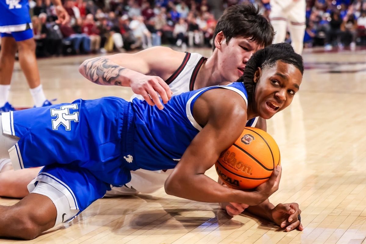 Feb 24, 2026; Columbia, South Carolina, USA; Kentucky Wildcats guard Jasper Johnson (2) steals the ball from South Carolina Gamecocks guard Mike Sharavjamts (55) during the first half at Colonial Life Arena. Mandatory Credit: Jeff Blake-Imagn Images