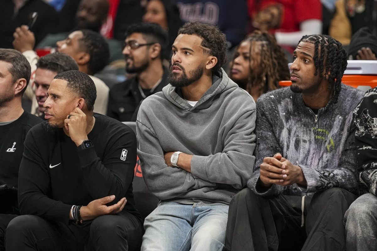 Feb 24, 2026; Atlanta, Georgia, USA; Washington Wizards guard Trae Young (3) watches from the bench during the game against the Atlanta Hawks during the second half at State Farm Arena. Mandatory Credit: Dale Zanine-Imagn Images