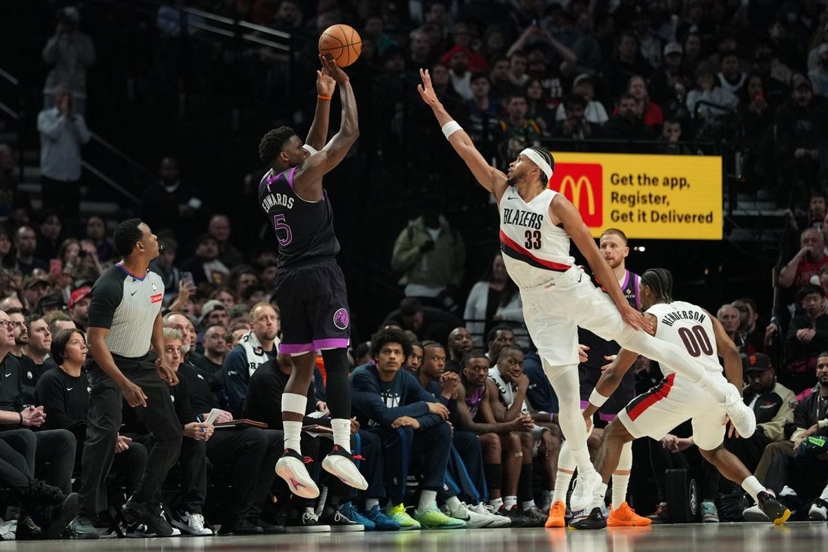 Feb 24, 2026; Portland, Oregon, USA; Minnesota Timberwolves guard Anthony Edwards (5) shoots over Portland Trail Blazers forward Toumani Camara (33) during the second half at Moda Center. Mandatory Credit: Soobum Im-Imagn Images