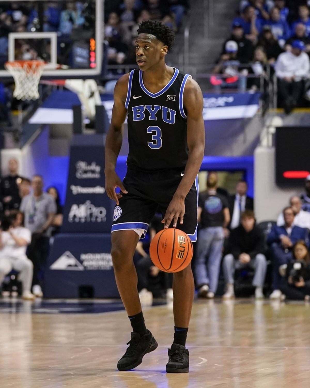 Feb 24, 2026; Provo, Utah, USA; BYU Cougars forward AJ Dybantsa (3) dribbles the ball during the first half against the UCF Knights at Marriott Center. Mandatory Credit: Aaron Baker-Imagn Images
