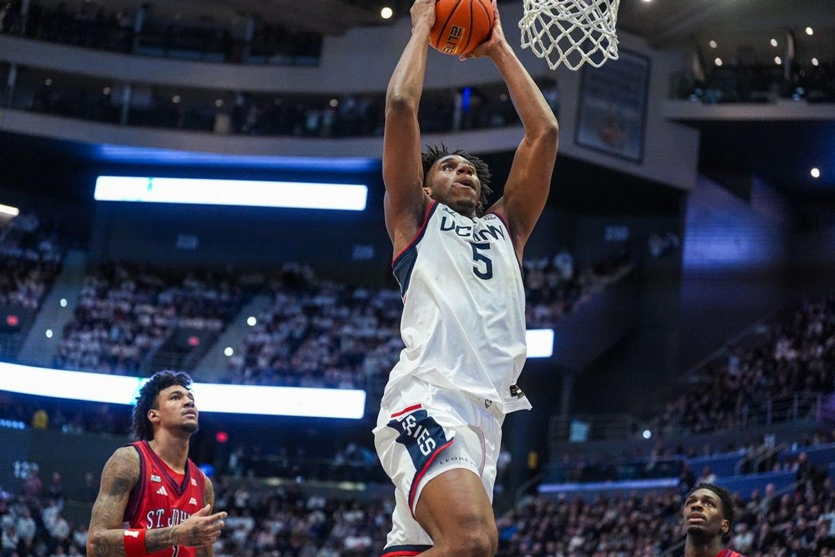 Feb 25, 2026; Hartford, Connecticut, USA; UConn Huskies forward Tarris Reed Jr. (5) drives the ball to the basket against the St. John's Red Storm in the first half at PeoplesBank Arena. Mandatory Credit: David Butler II-Imagn Images