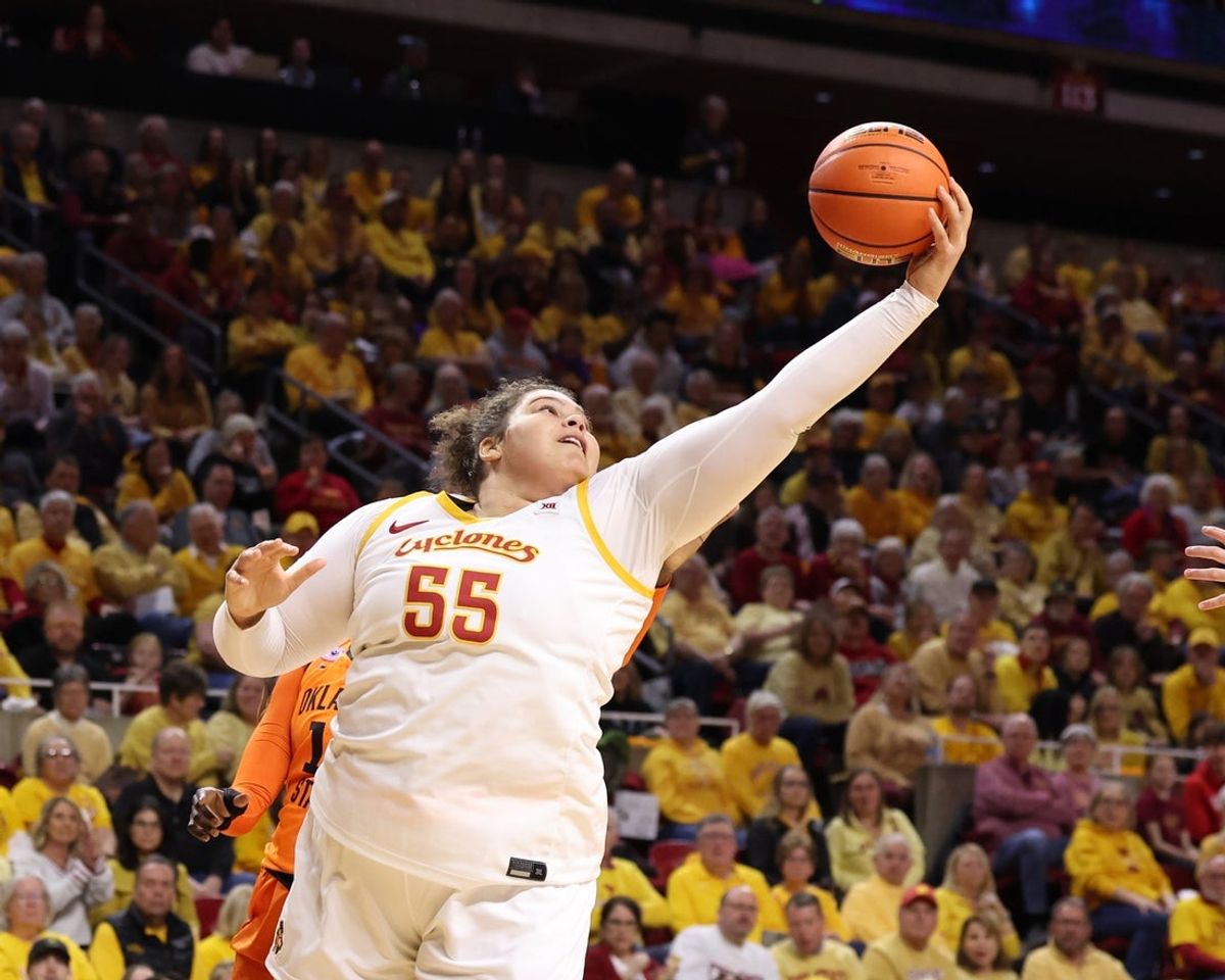 Feb 25, 2026; Ames, Iowa, USA; Iowa State Cyclones center Audi Crooks (55) grabs a rebound during their game with the Oklahoma State Cowboys in the first half at James H. Hilton Coliseum. Mandatory Credit: Reese Strickland-Imagn Images
