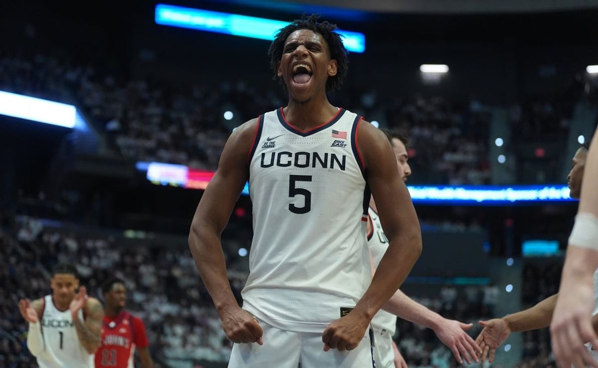 Feb 25, 2026; Hartford, Connecticut, USA; UConn Huskies forward Tarris Reed Jr. (5) reacts after a basket against the St. John's Red Storm in the second half at PeoplesBank Arena. Mandatory Credit: David Butler II-Imagn Images