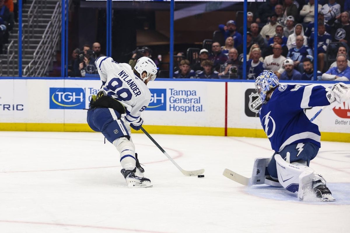 Feb 25, 2026; Tampa, Florida, USA; Tampa Bay Lightning goalie Andrei Vasilevskiy (88) makes a save on Toronto Maple Leafs forward William Nylander (88) during the second period at Benchmark International Arena. Mandatory Credit: Morgan Tencza-Imagn Images