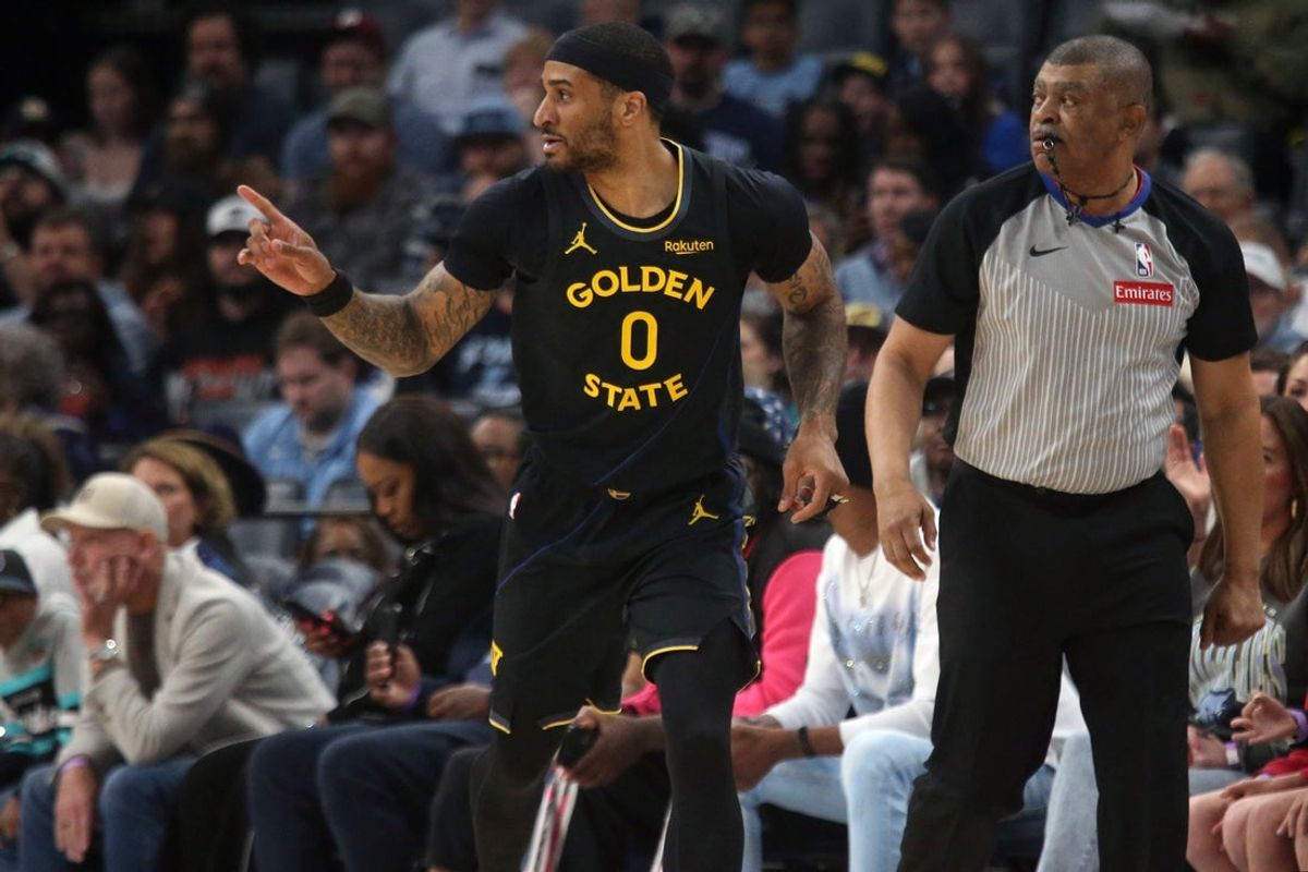 Feb 25, 2026; Memphis, Tennessee, USA; Golden State Warriors guard Gary Payton II (0) reacts after a three point basket during the second quarter against the Memphis Grizzlies at FedExForum. Mandatory Credit: Petre Thomas-Imagn Images