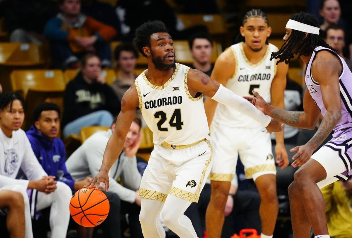 Feb 25, 2026; Boulder, Colorado, USA; Colorado Buffaloes guard Barrington Hargress (24) controls the ball in the first half against the Colorado Buffaloes at the CU Events Center. Mandatory Credit: Ron Chenoy-Imagn Images