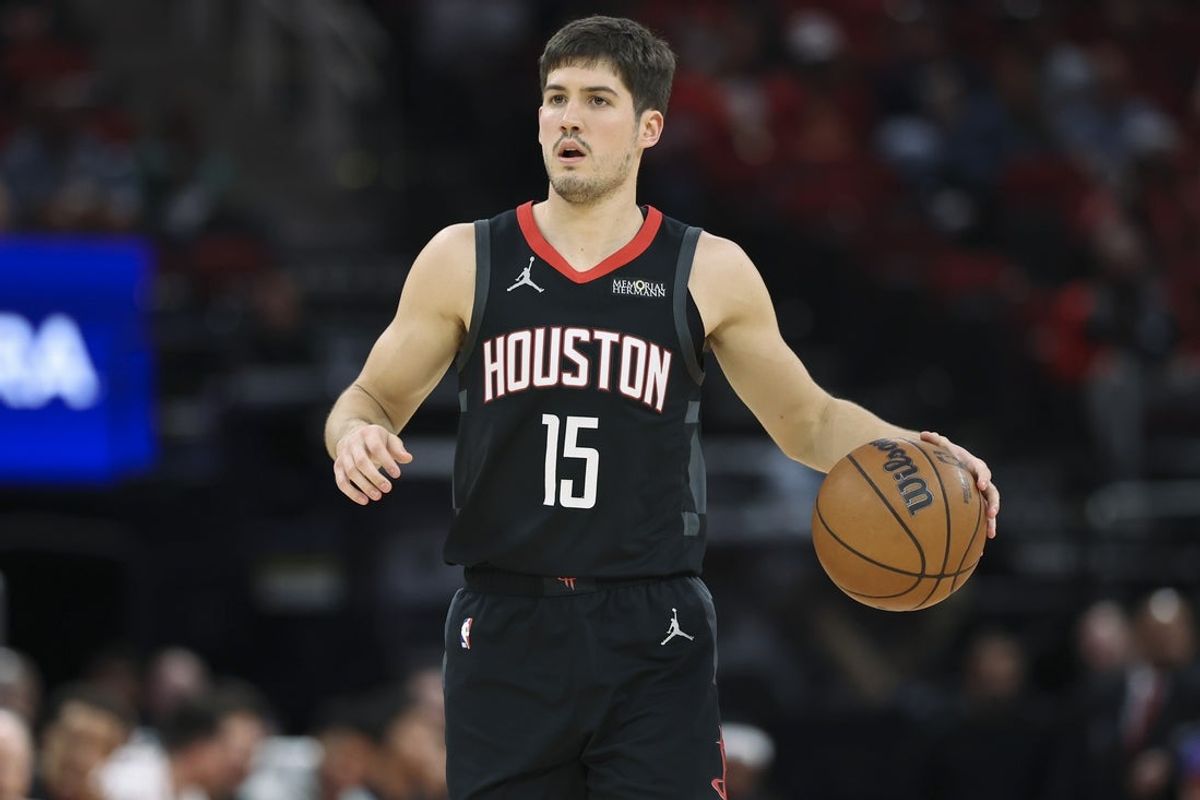 Feb 25, 2026; Houston, Texas, USA; Houston Rockets guard Reed Sheppard (15) brings the ball up the court during the first quarter against the Sacramento Kings at Toyota Center. Mandatory Credit: Troy Taormina-Imagn Images