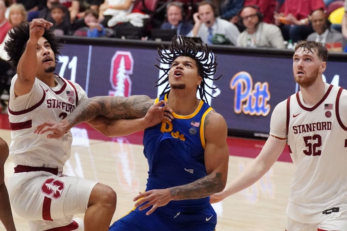 Feb 25, 2026; Stanford, California, USA;  Pittsburgh Panthers forward Cameron Corhen (2) fights Stanford Cardinal forward Donavin Young (2) and forward/center Aidan Cammann (52) for a rebound in the second half at Maples Pavilion. Mandatory Credit: David Gonzales-Imagn Images