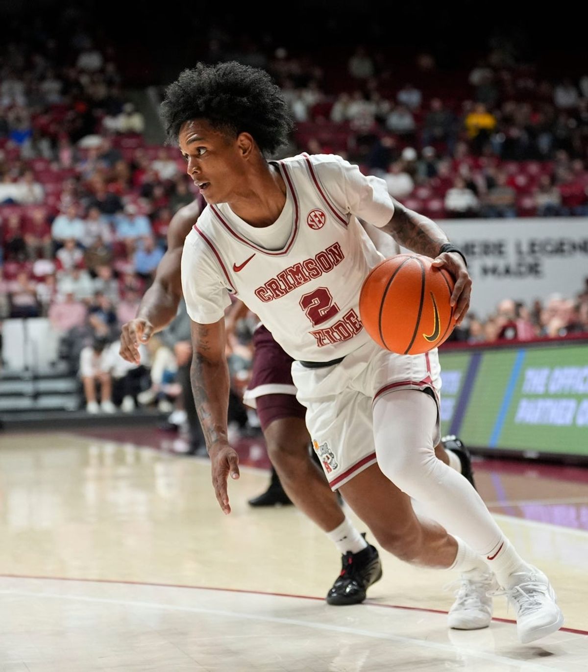 Feb 25, 2026; Tuscaloosa, AL, USA; Alabama guard Aden Holloway (2) dribbles along the baseline at Coleman Coliseum. Alabama defeated Mississippi State 100-75. Mandatory Credit: Gary Cosby Jr.-Tuscaloosa News