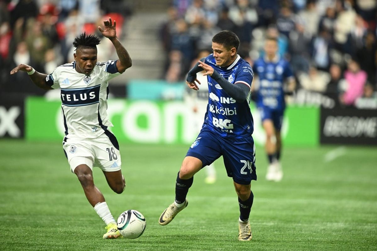 Feb 25, 2026; Vancouver, British Columbia, CAN;  Vancouver Whitecaps defender Edier Ocampo (18) battles for the ball against CS Cartagines forward Suhander Zuniga (24) during the second half at BC Place. Mandatory Credit: Anne-Marie Sorvin-Imagn Images