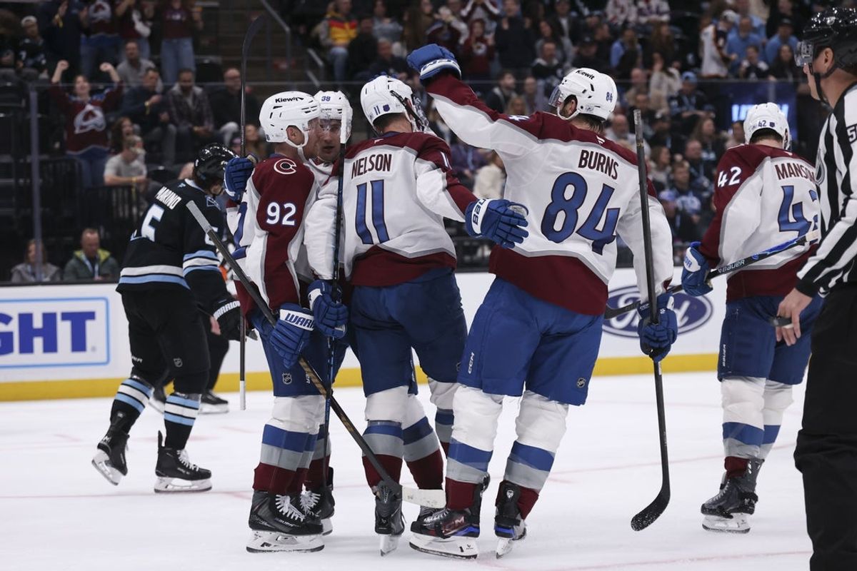 Feb 25, 2026; Salt Lake City, Utah, USA; The Colorado Avalanche celebrate a goal against the Utah Mammoth by center Brock Nelson (11) during the second period at Delta Center. Mandatory Credit: Rob Gray-Imagn Images