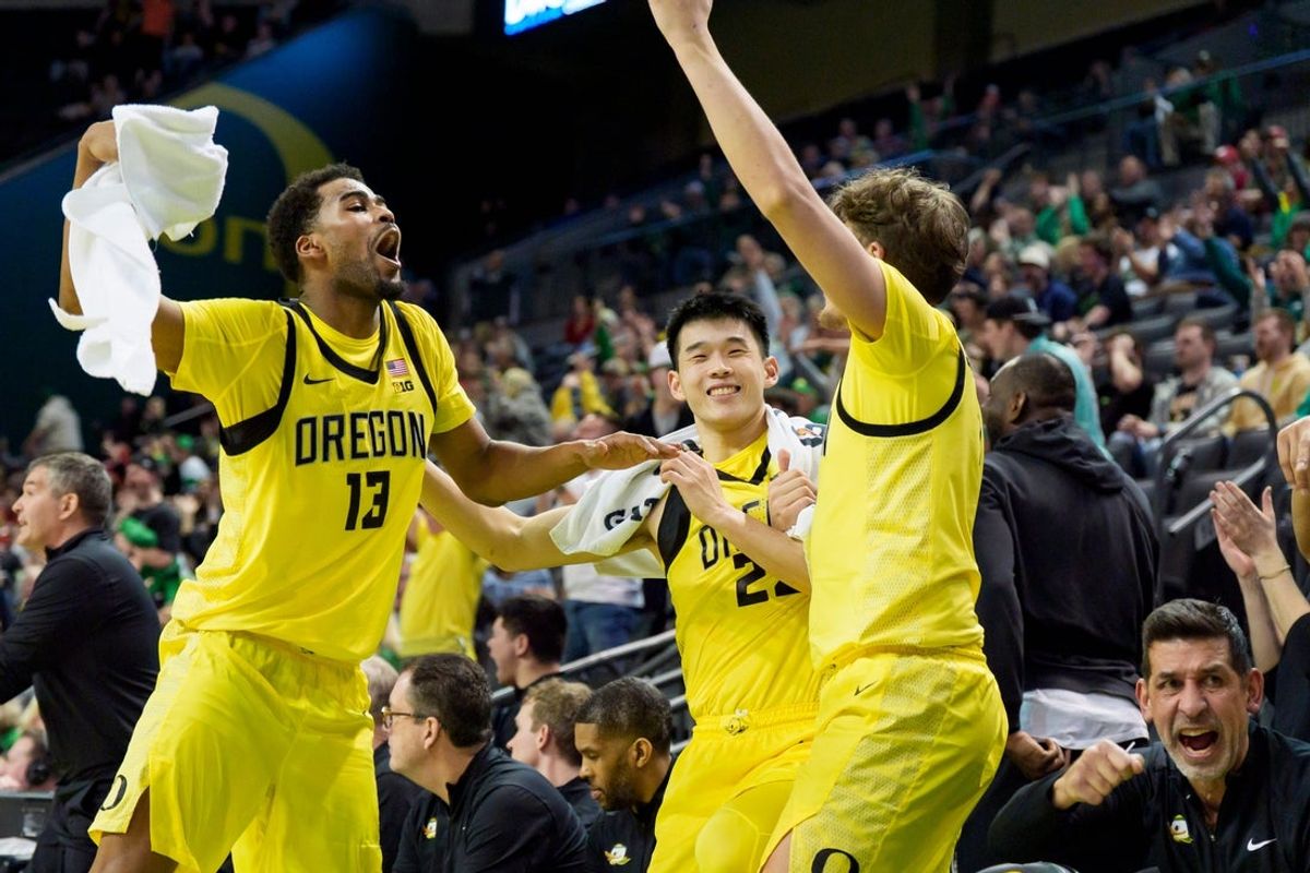 The Oregon bench cheers as the Oregon Ducks host the Wisconsin Badgers on Feb. 25, 2026, at Matthew Knight Arena in Eugene, Oregon.