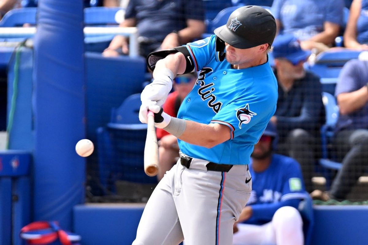 Feb 26, 2026; Dunedin, Florida, USA; Florida Marlins left fielder Kyle Stowers (28) hits a single in the first inning against the Toronto Blue Jays during spring training at TD Ballpark. Mandatory Credit: Jonathan Dyer-Imagn Images