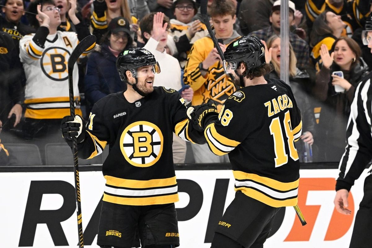Feb 26, 2026; Boston, Massachusetts, USA; Boston Bruins left wing Viktor Arvidsson (71) celebrates a goal against the Columbus Blue Jackets with center Pavel Zacha (18) during the first period at TD Garden. Mandatory Credit: Eric Canha-Imagn Images