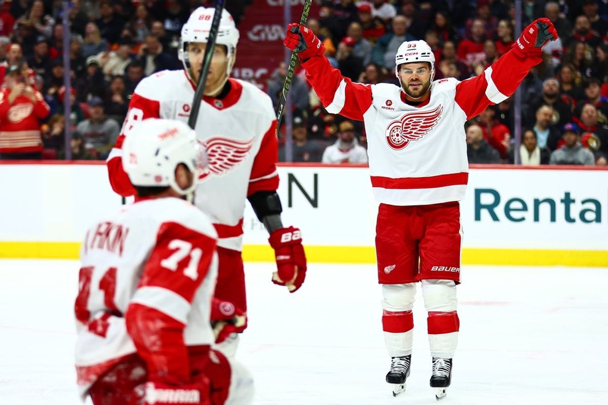 Feb 26, 2026; Ottawa, Ontario, CAN; Detroit Red Wings right wing Alex DeBrincat (93) reacts after a goal from center Dylan Larkin (71) during the second period against the Ottawa Senators at Canadian Tire Centre. Mandatory Credit: Keito Newman-Imagn Images