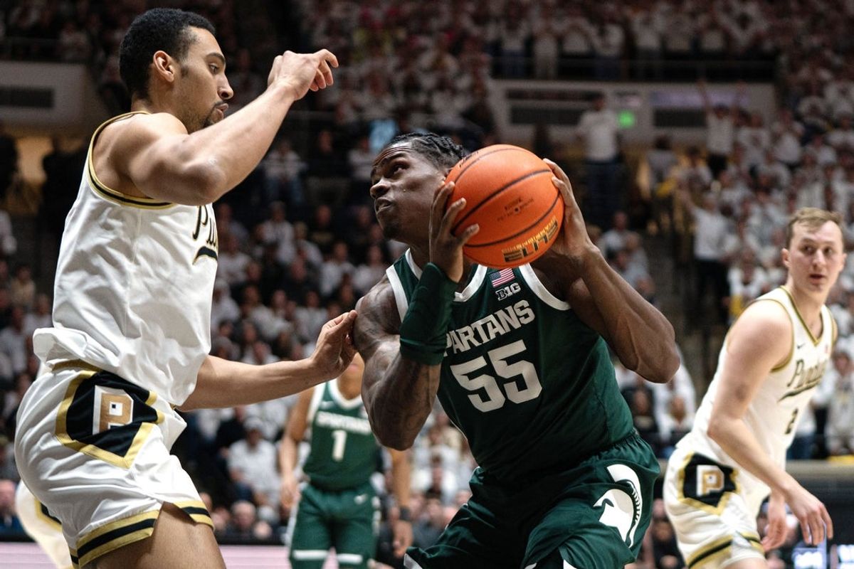 Feb 26, 2026; West Lafayette, Indiana, USA; Michigan State Spartans forward Coen Carr (55) looks to shoot the ball during the first half of a game against the Purdue Boilermakers at Mackey Arena. Mandatory Credit: Jacob Musselman-Imagn Images